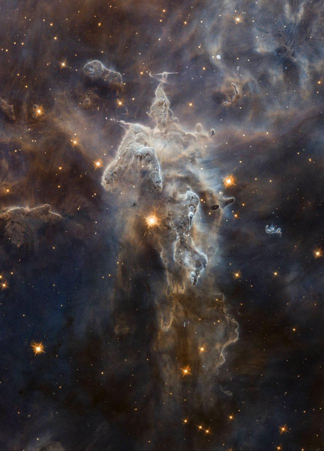The Mystic Mountain region of the Carina Nebula. 
Credit:  Hubble
