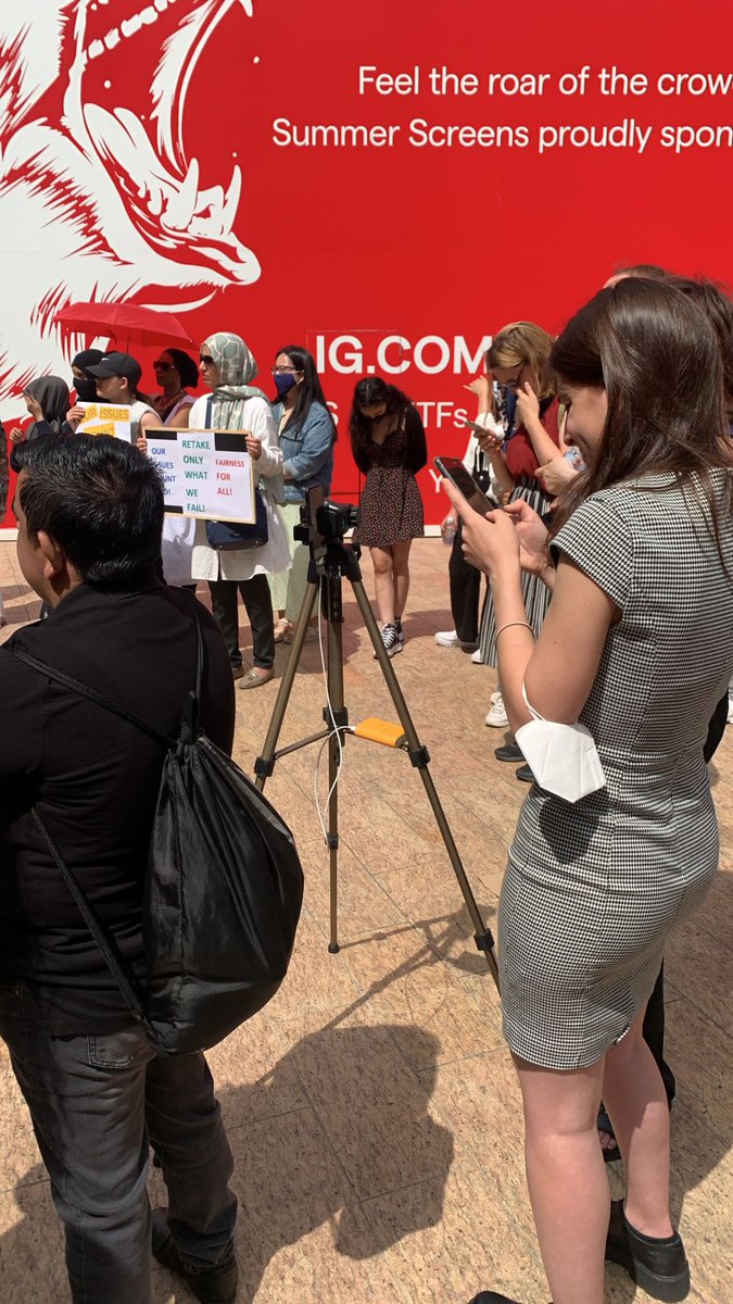 sam_9907's tweet photo. Trainees protest outside the #gphc Gphc building to raise their concerns and issues experienced with the June 2022 exam. It is unacceptable that students had to sit exams in the conditions they put us in, also the blueprint of the exam was not reflective of the samples questions https://t.co/Bntfh34eb0