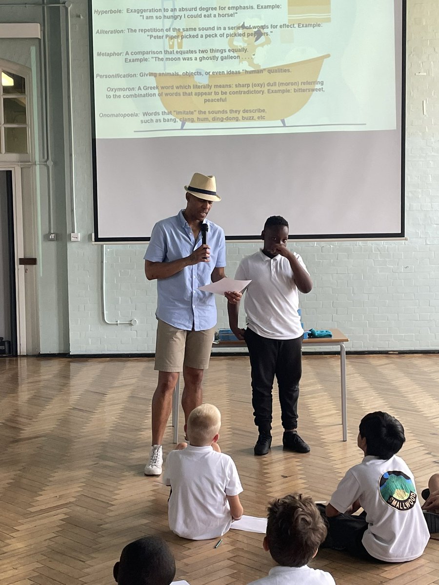 Smallwoodschool's tweet photo. Inspiring #poetry. @iamkingkimba is a huge hit with our writers! Don’t forget to purchase your signed copies of his first poetry book #writethewrongs in the playground today. #internationalweek #wearepoets https://t.co/ijKbKjbP7S