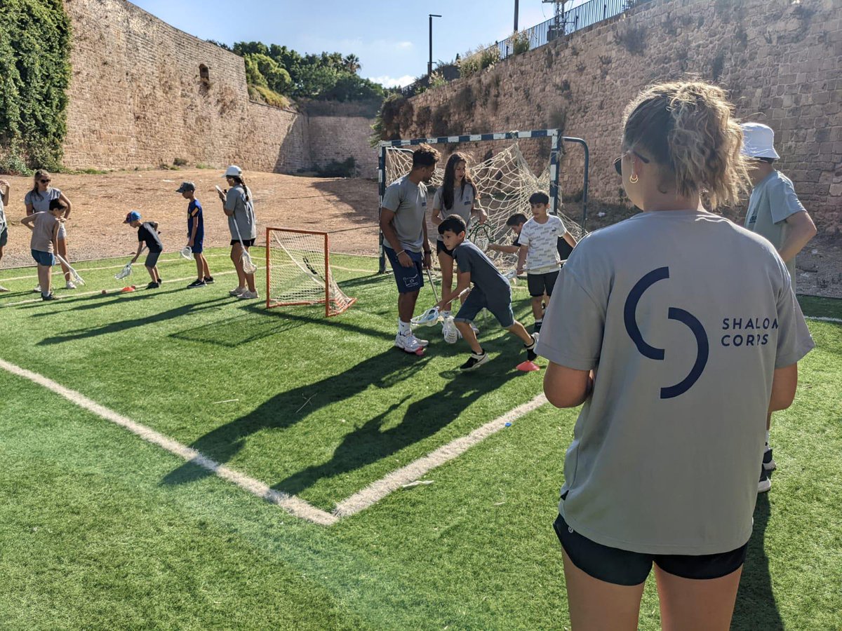 CorpsShalom's tweet photo. 30 US lacrosse players from colleges across the country are officially settled in Ashkelon, Israel to begin their three-week volunteer program. 
The athletes are working in and around the region’s border towns to teach life skills and build the local community through lacrosse. https://t.co/1ZDRwR9vsv