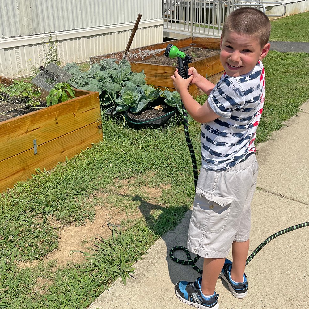 Hopkins Elementary students are harvesting radishes, kale and garlic from the school garden this summer. <a href="/HopkinsRoadES/">HopkinsES</a> STEAM teacher Rebecca Smart and first grade/lead science teacher Stephanie White partnered with <a href="/GR_Fit4Kids/">Fit4Kids</a> to plant the veggies. #oneCCPS #CCPSontheGo