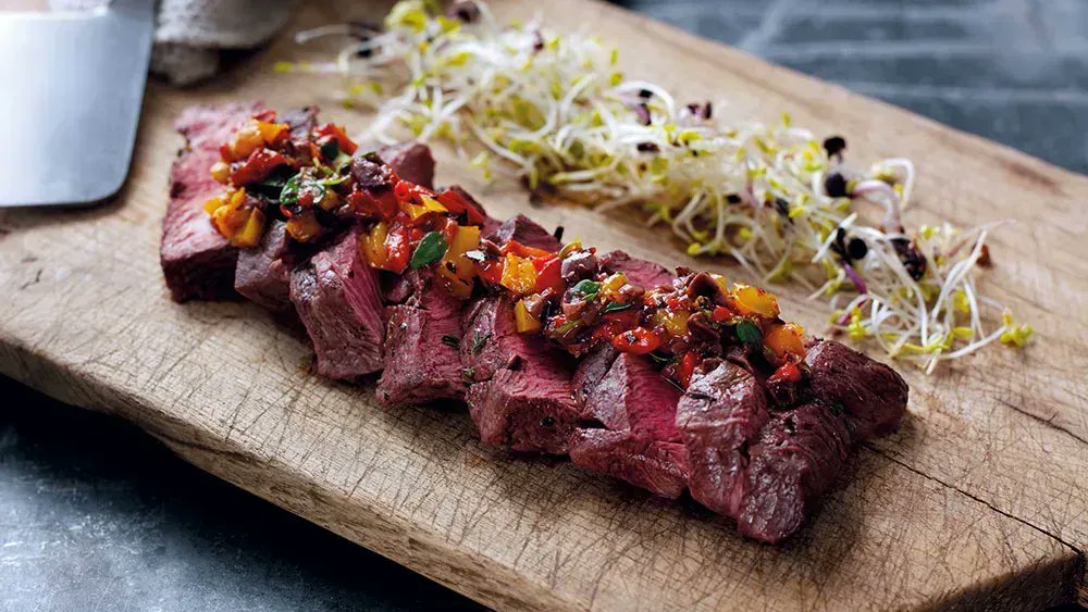 This is a lovely recipe featuring flat iron steak cooked under the grill or on a prepared barbecue, then topped with a delicious roasted pepper relish bit.ly/2wZ3jPq #crouchend #butcher