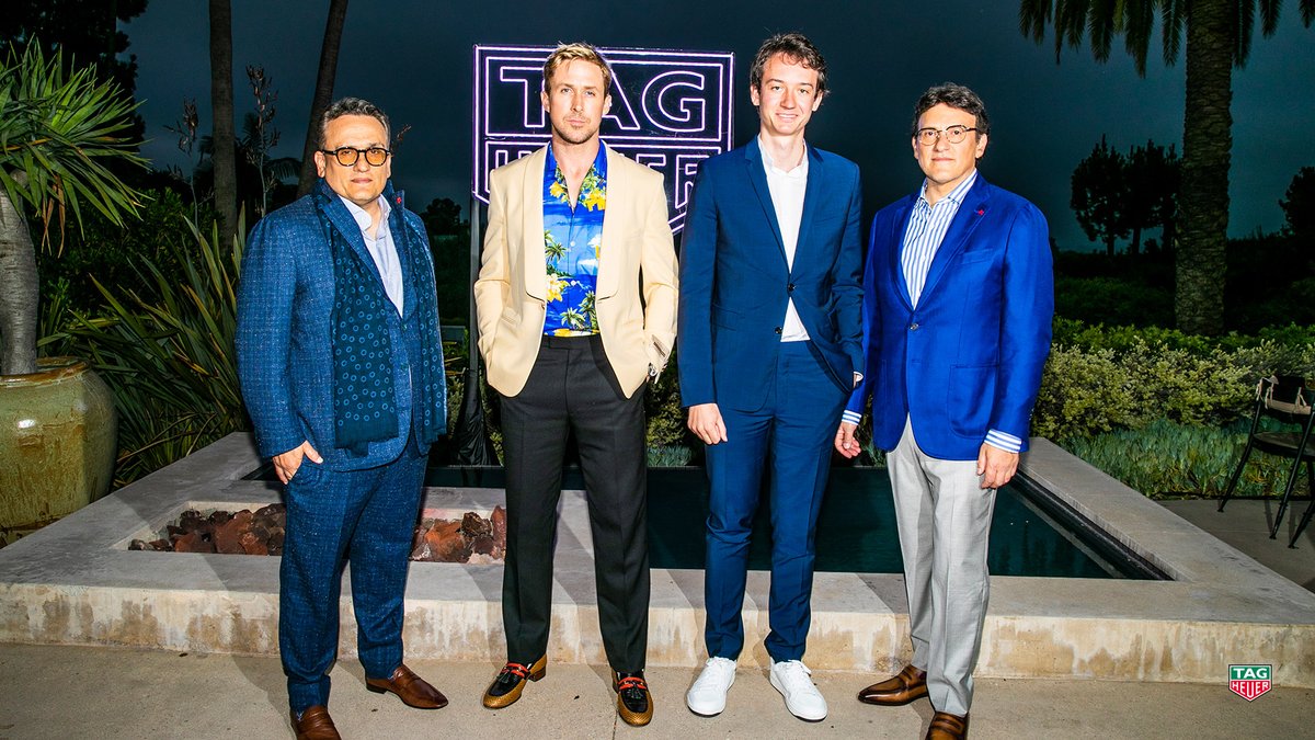 TAGHeuer's tweet photo. Raising a toast to #TheGrayMan! We’re so excited to celebrate the launch of #TheGrayMan with @RyanGosling and the cast and crew - and to see the #TAGHeuerCarrera Three Hands on the silver screen! https://t.co/SkYLGyUv4k
