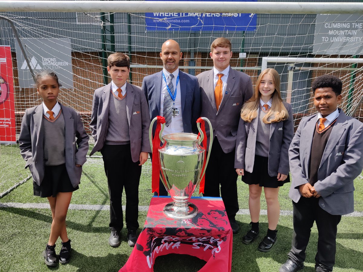 dixons_ba's tweet photo. We had a VIP guest in school to celebrate our students success this year. The Champions League Trophy was the talk of the Academy and it was great to get up close to such a famous cup. Thanks to @LFC for bringing  Ol' Big Ears to see us. #TeamDixons https://t.co/YHH5iI3NoC