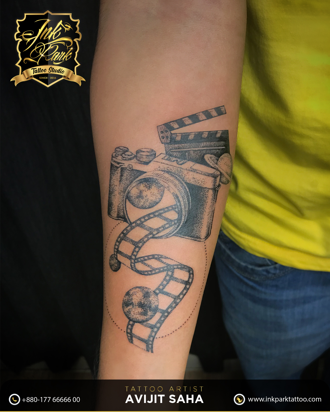 Film camera tattoo on the ankle