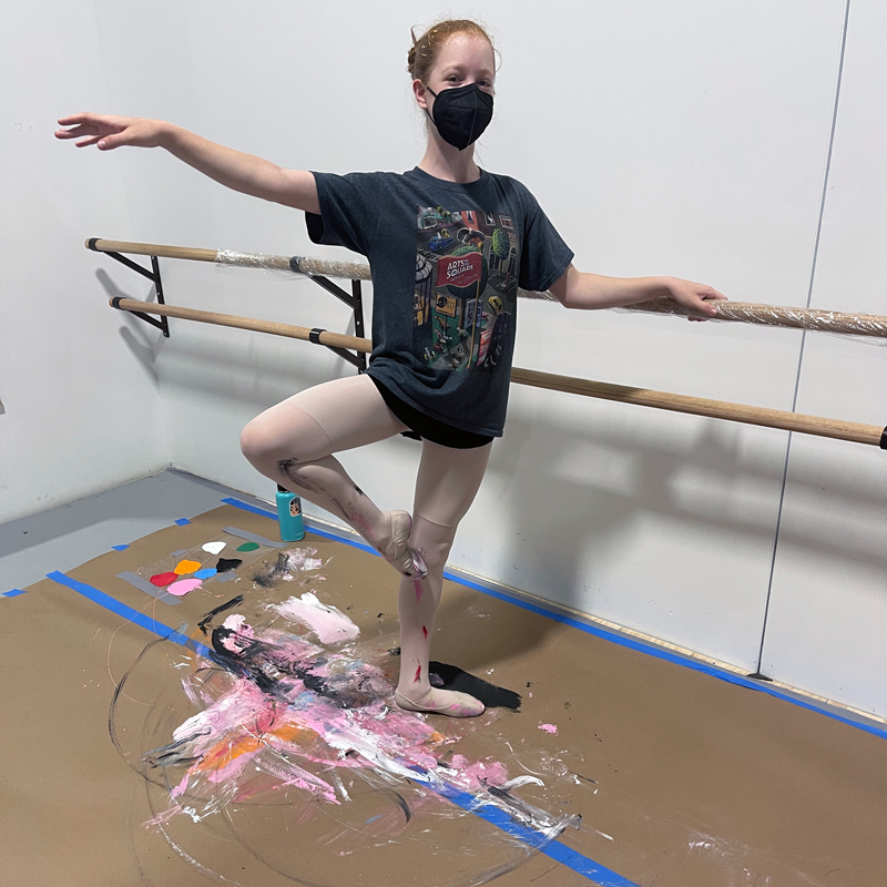 Last week, Da'Rius and the Upper Level dancers made art in multiple forms. As they took class, they stepped in different beautiful colors of paint and created a masterpiece on the paper beneath them!