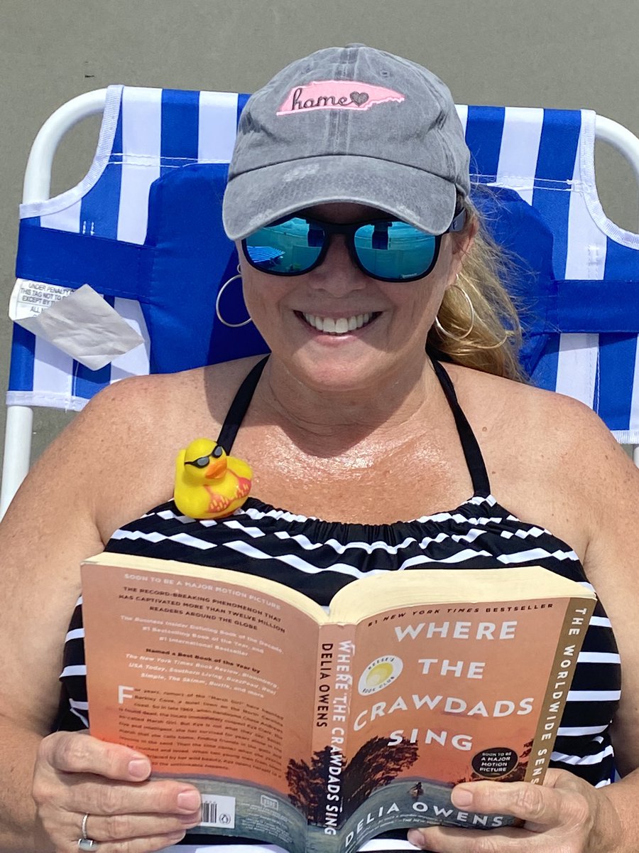 TLWarner297's tweet photo. Lil Biddy enjoying a good book with me while relaxing at the beach.  #RooseveltDucksOut @KCS_Roosevelt https://t.co/1zRPMElAG5