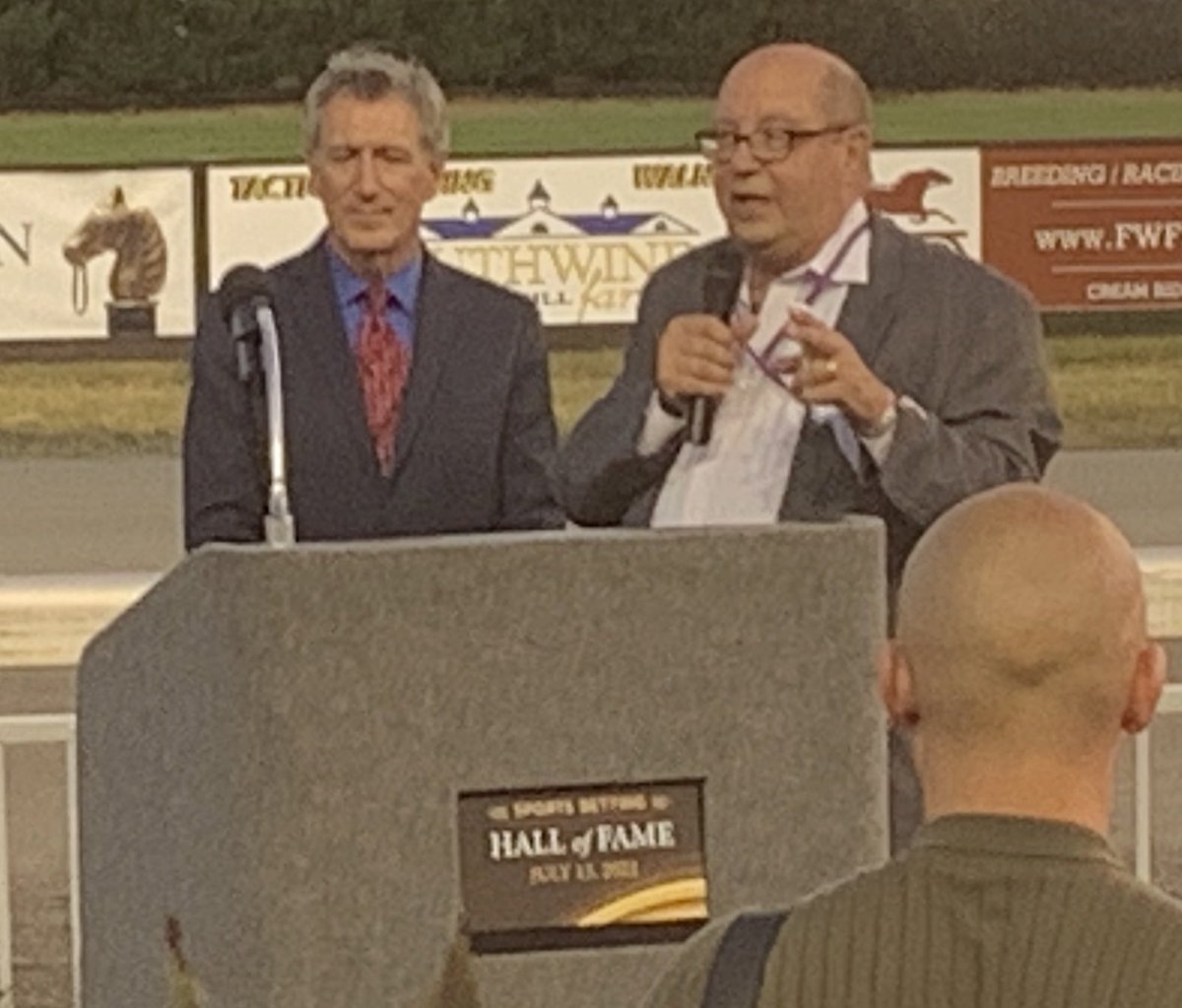 PatrickE_Vegas's tweet photo. Scenes from (far from) Sin City: Longtime oddsmaker and current @southpointlv sportsbook director Chris Andrews (@andrewssports) addresses the #SBCSummitNorthAmerica crowd as he’s inducted into the Sports Betting Hall of Fame. A total class act and an honor richly deserved. https://t.co/psYUaywWOk