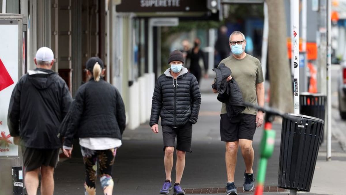 New Zealand announces free masks, tests as health system struggles with