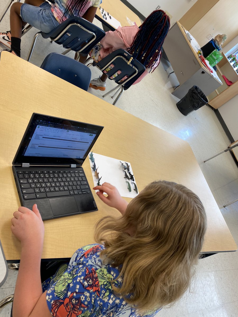 Science/Math Day!  The students are learning how to classify Ocean Animals and apply fractions.