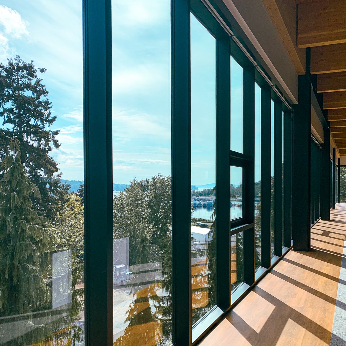 cparch_'s tweet photo. Floor-to-ceiling windows provide an open view of the bay. The trees provide an added layer of protection to the building. #architecture #Ladysmith #vanisle #Nanaimo #pacificnorthwest https://t.co/SArUiTkNKN