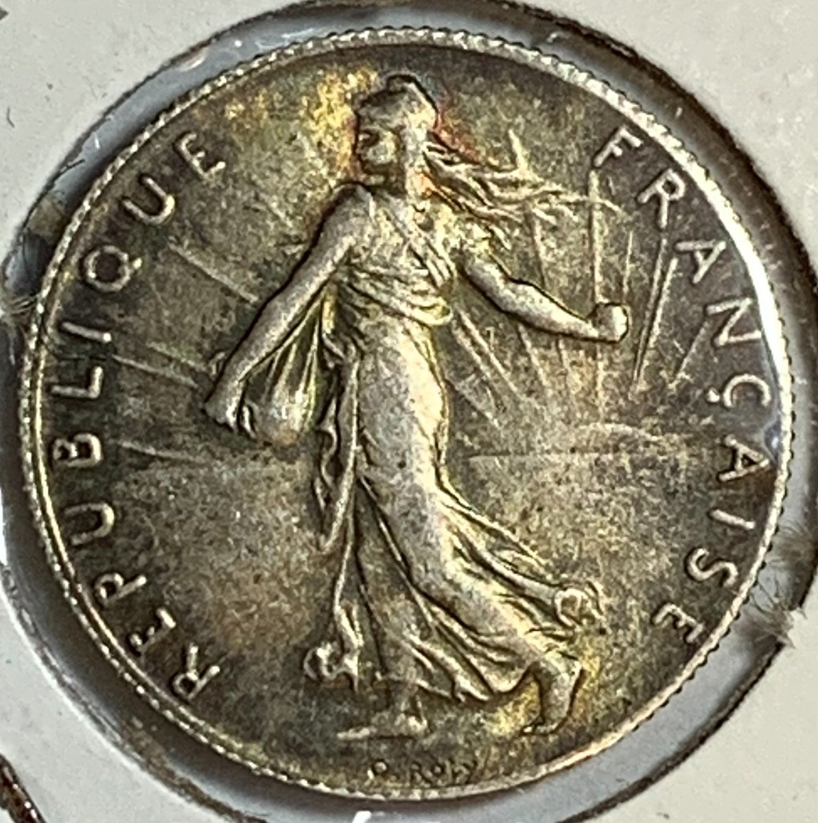 BaltimoreCoins's tweet photo. In honor of #BastilleDay, we are showing French coins all week. This is a 1904 50 #Centime silver #coin. The obverse shows Marianne (national symbol of the French Republic) sowing seeds. The reverse is an olive branch and date. Mintage = 4,000,000. #numismatics #coinclub https://t.co/024WKVDJxD