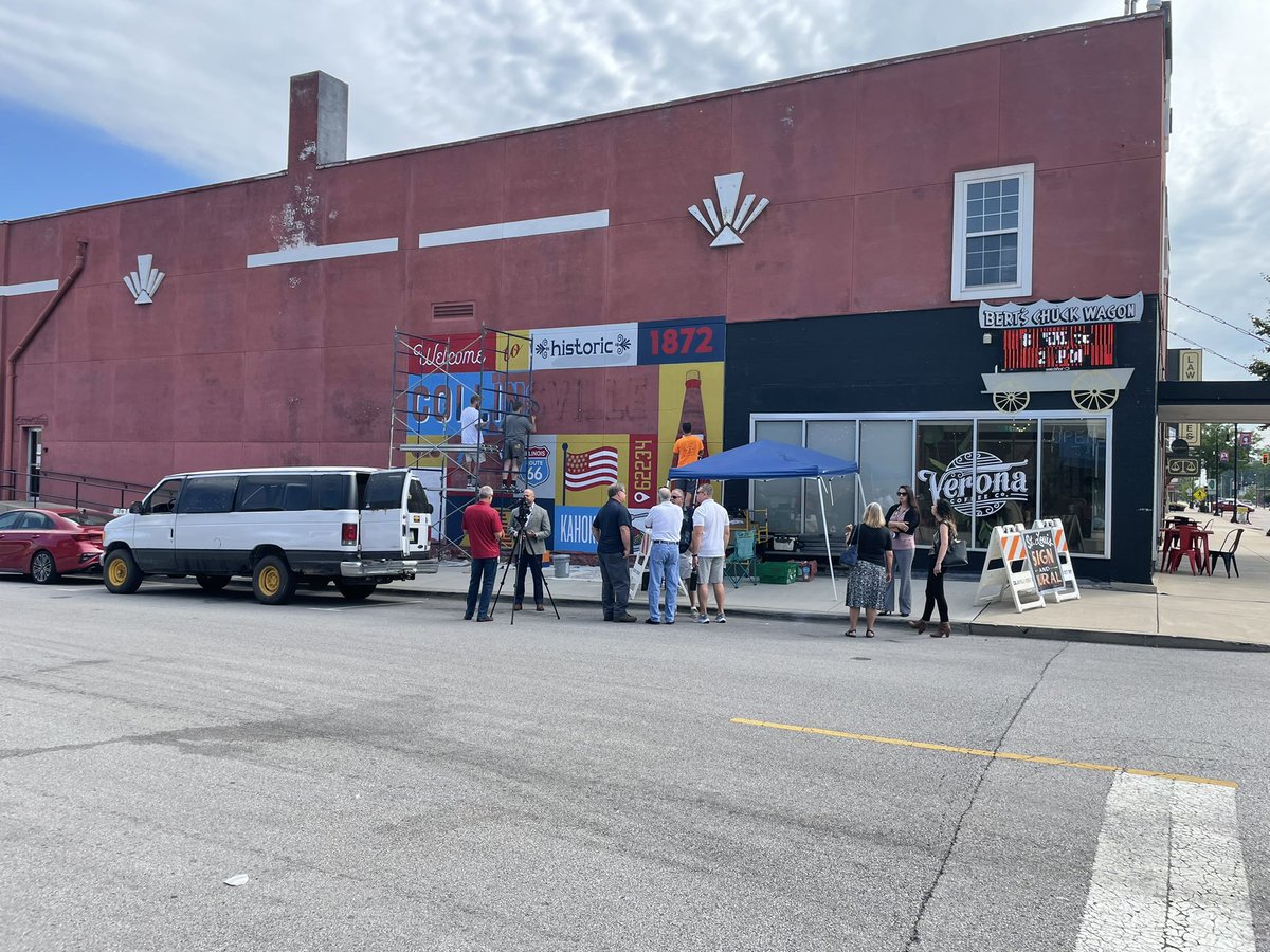 DavidMueth's tweet photo. Route 66 Art Mural Trail Gets Underway. Artist Daniel Ricketts begins work on the Collinsville mural being painted on the side wall of the Bert’s Chuck Wagon building at Center and Main. Murals will be completed in 12 Route 66 communities this summer. https://t.co/fvobO3wnWl
