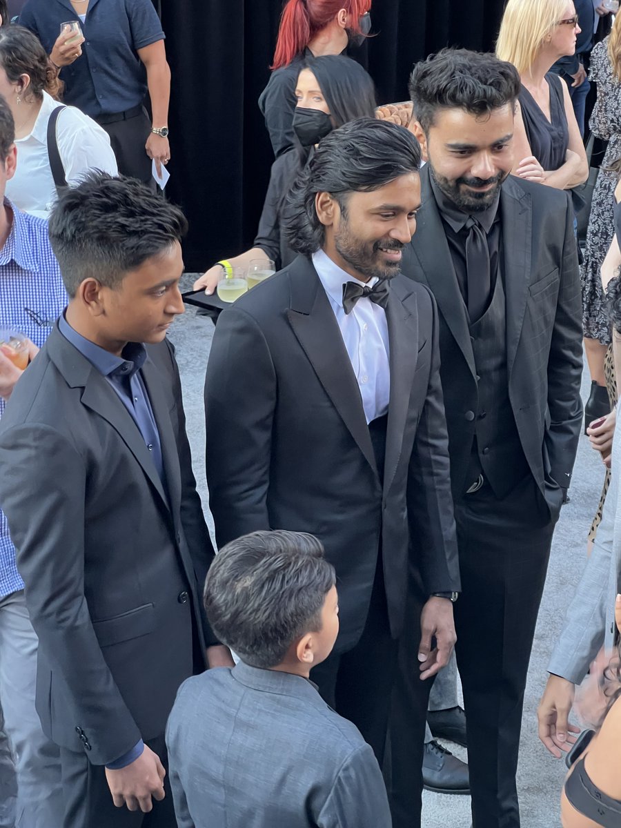 MarkGreaneyBook's tweet photo. It's freaking @dhanushkraja on the red carpet with his handsome sons!!!! I was crazy excited just to get a glimpse of him, though I didn't get to introduce myself. If you don't know who this is, trust me . . . you will! #dhanush #agbo #thegrayman #markgreaney https://t.co/ZnYpWmGKIZ
