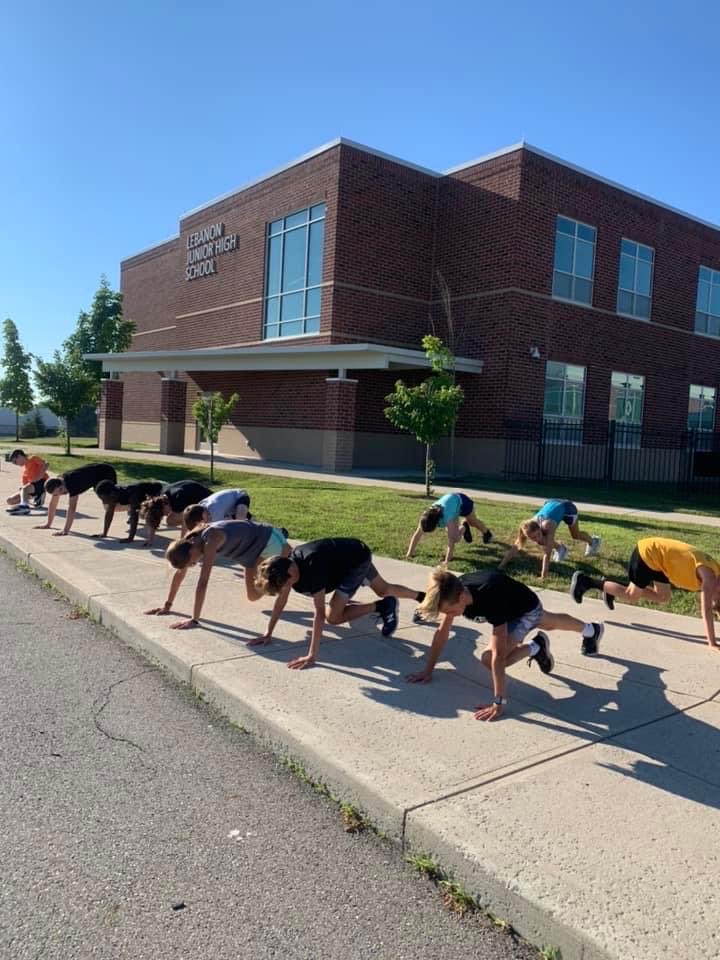 PeterPanBoy666's tweet photo. The Junior High Cross Country runners are working on core exercises for a stronger physique. Go Lebanon Warriors. @lebanonjrhigh @LJHSAD @LHSWarriorsXC @WarZoneLHS @LCS_BC https://t.co/vlERZSkk7R