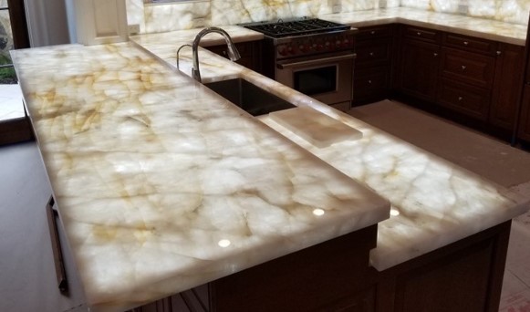 granite_dc's tweet photo. Cristallo quartzite features a hazy white background paired with grey and orange flecking and veining throughout the slab for a multi-dimensional appearance. Cristallo has a beautiful “white crystal” look that gives the material a sense of elegance. https://t.co/J79RRmd6oU