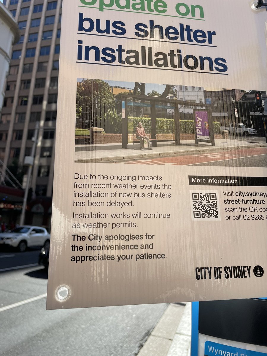 CaroMayolC's tweet photo. There’s no bus shelter here, being a bus stop in the middle of Sydney’s CBD, and they stop the installation due to rain. Great. https://t.co/EIq4UlTcFx