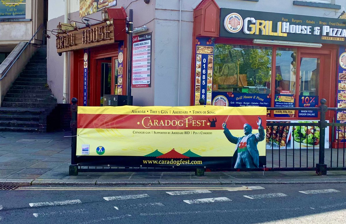 St_Elvans's tweet photo. Great to see all the colourful Caradogfest banners up in and around Aberdare town centre this morning ❤️ Don’t miss all the incredible events taking place in Aberdare “Town of Song” this weekend! 🏴󠁧󠁢󠁷󠁬󠁳󠁿 https://t.co/MejGK2QgvB #Caradogfest #Aberdare #VisitRCT https://t.co/6uv9LOi7Yb