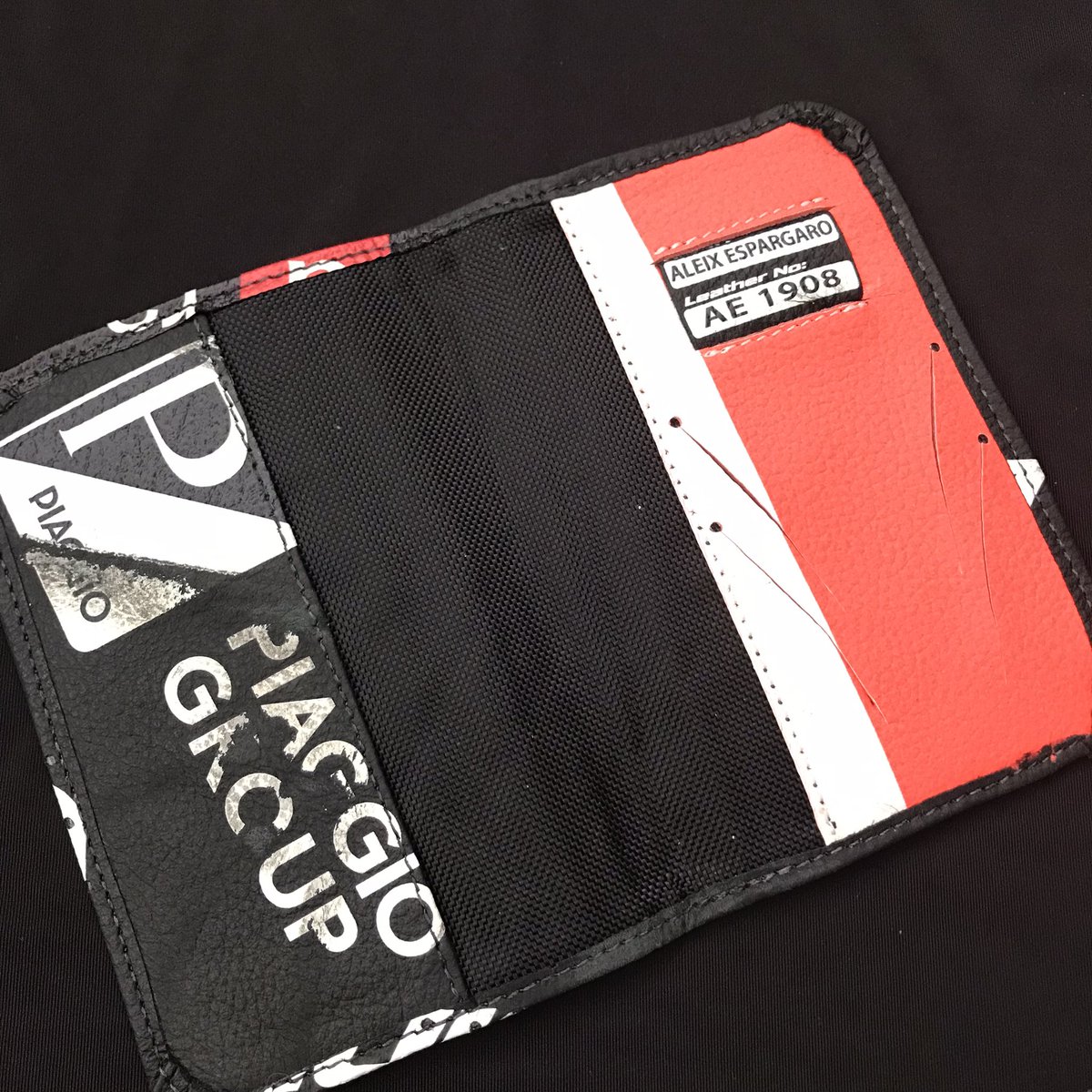 ixon_japan's tweet photo. フランス🇫🇷本社から、世界に一つだけのパスポートケースを頂きました！

現在MotoGPランキング2位の、アプリリアファクトリー、アレイシ・エスパロガロ選手のレザースーツから作成したものです♪

このツイートをリツイートするだけで、エントリーになります！

1名様にプレゼント🎁

当選者にDMします https://t.co/PbJ2E1A7mP