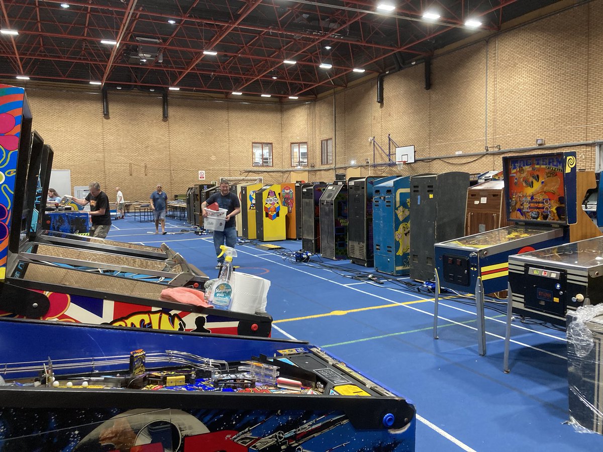 NotFatApollo's tweet photo. Consoles unpacked, standing up the pins. Another 30 pins on the way. And here’s Poibug. I mean, you can hear Poibug. 😆@ukpinball @NERGOfficial https://t.co/ogqXdCrXZn