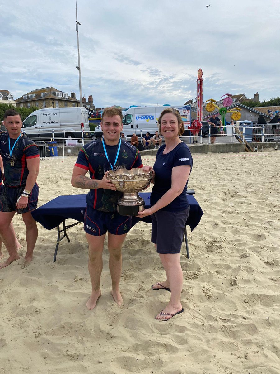 Royal Navy Rugby (@rnrugby) on Twitter photo Summer ☀️ is here & for <a href="/RNRugby/">Royal Navy Rugby</a> community rugby 🏉 the beach ⛱️ rugby tournament is a huge highlight.
This year <a href="/HMSPWLS/">HMS Prince of Wales</a> were victorious is the women's competition whilst <a href="/CommandoTRG/">Commando Training</a> won the mens tournament.
Capt Sarah Oakley, CO of <a href="/DartmouthBRNC/">Britannia Royal Naval College</a> presented the trophies🏆 Summer ☀️ is here & for <a href="/RNRugby/">Royal Navy Rugby</a> community rugby 🏉 the beach ⛱️ rugby tournament is a huge highlight.
This year <a href="/HMSPWLS/">HMS Prince of Wales</a> were victorious is the women's competition whilst <a href="/CommandoTRG/">Commando Training</a> won the mens tournament.
Capt Sarah Oakley, CO of <a href="/DartmouthBRNC/">Britannia Royal Naval College</a> presented the trophies🏆