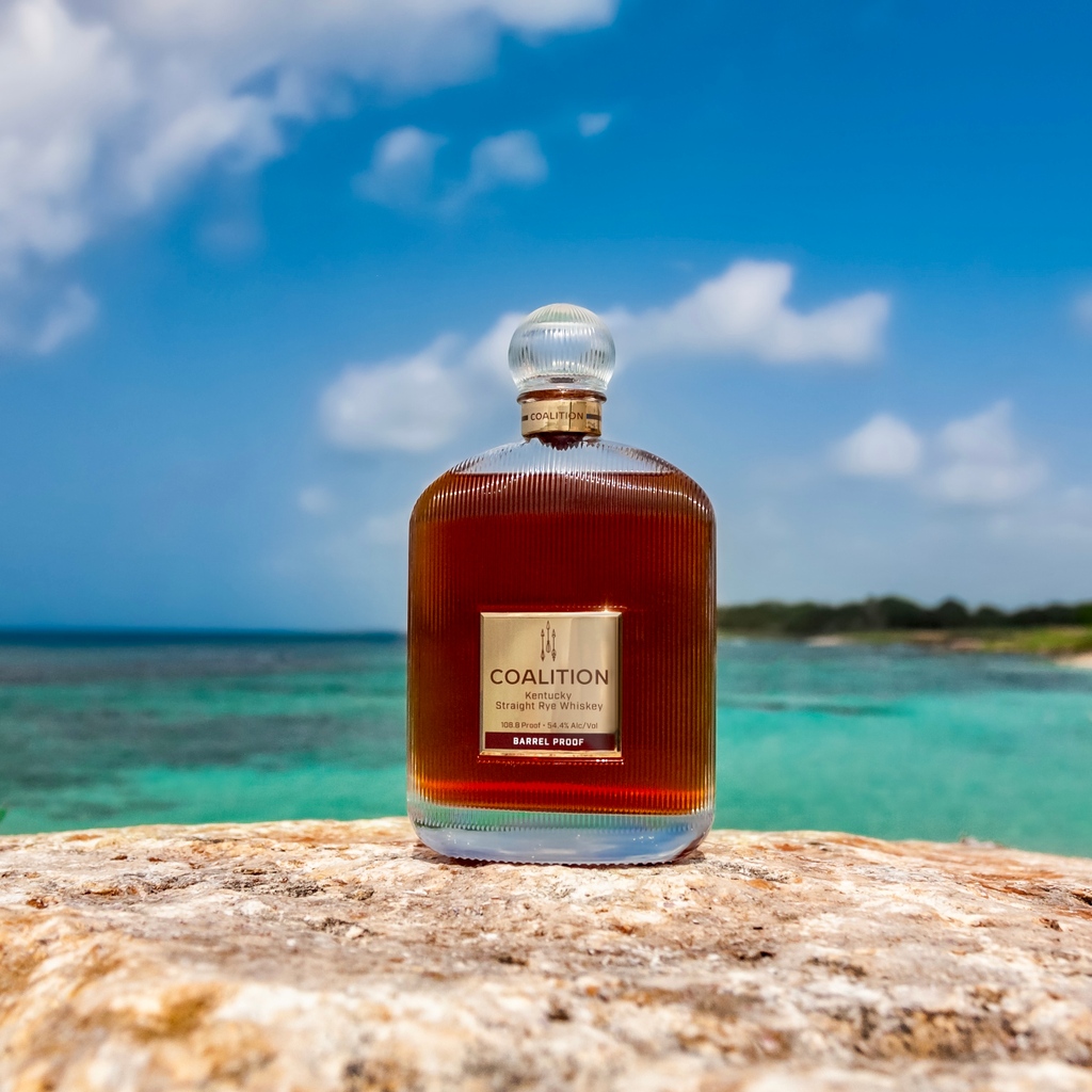 Coalition100Rye's tweet photo. A bottle of delicious #CoalitionRye with the view. Can you imagine the nicer setting? https://t.co/lzrc0i8gaP