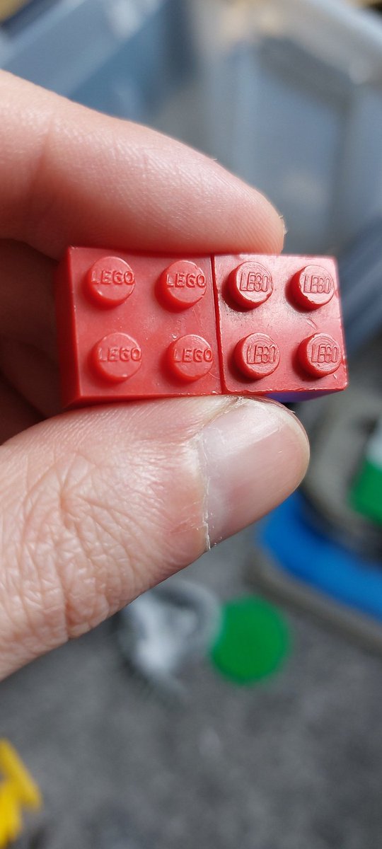 nootherandrew's tweet photo. Is the one on the left a genuine Lego brick? You can see the font is different and the quality seems different too. I bought a load of Lego from a colleague and they probably don't remember but there were mega block and other non Lego in the mix. @LEGO_Group #LEGO #fakelego https://t.co/ER36lO9el6