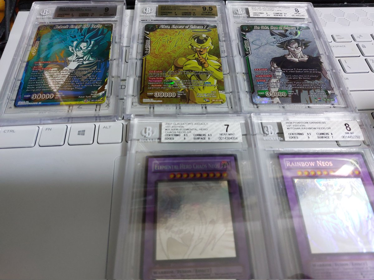 AegisMK2's tweet photo. After a long time they are finally here! Not the perfect score as some grown up with me and some I played when no one cares about grading. But the Frieza is looking great! #gradingcards #bgsgrading #bgs #dbstcg #yugioh https://t.co/3Puey3Djjo