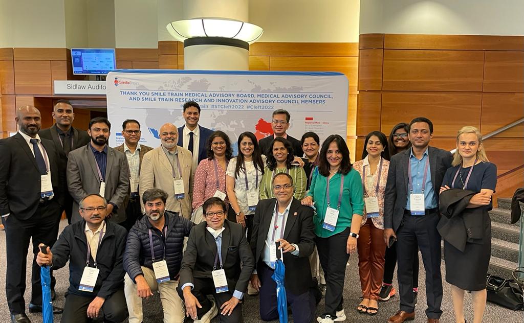 SmileTrainIndia's tweet photo. Members of the @SmileTrainIndia team along with fellow #SmileMakers at the end of an invigorating and productive week together at the 14th International Cleft Congress in Edinburgh. 
#Cleft2022 #CleftProud https://t.co/l1WchvW2r6