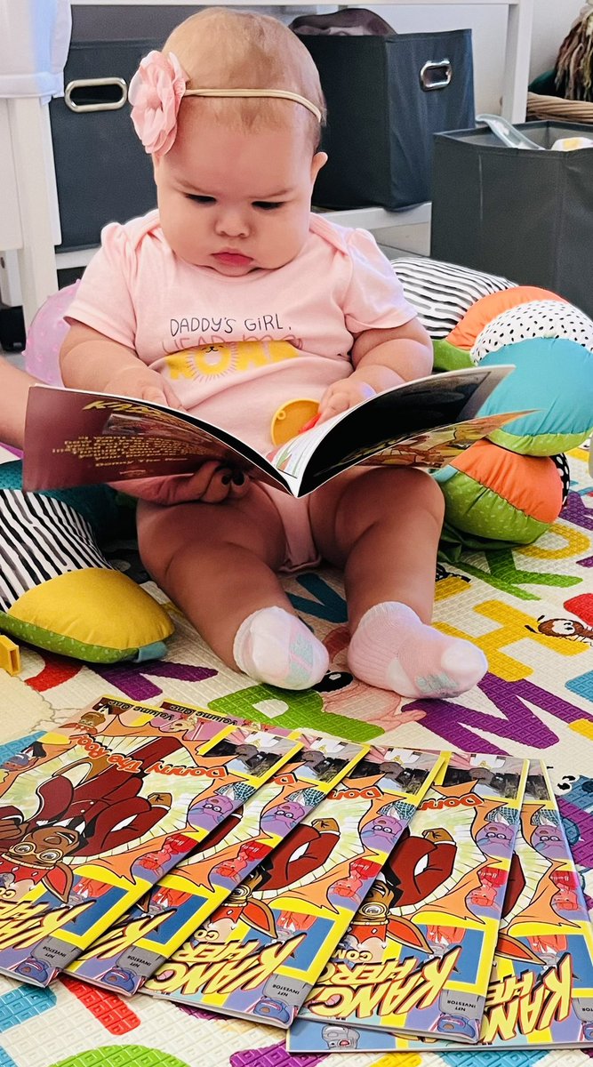 TeamCagedAnimal's tweet photo. My daughter with her little collection of @KangarooHeroes @PrinceDonnell_ Comic books. Starting her young, as should you! https://t.co/nSIdvRaiNx
