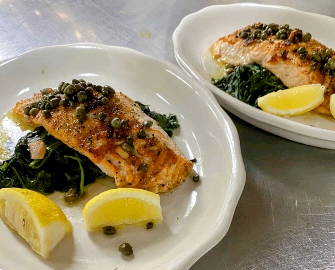 KreisSteakhouse's tweet photo. #FishFriday reminder for #Kreis' Fresh Atlantic #SalmonFillet (with capers, fresh lemon, and a side). Didn't want you to forget about them! https://t.co/tl2LC8ibww