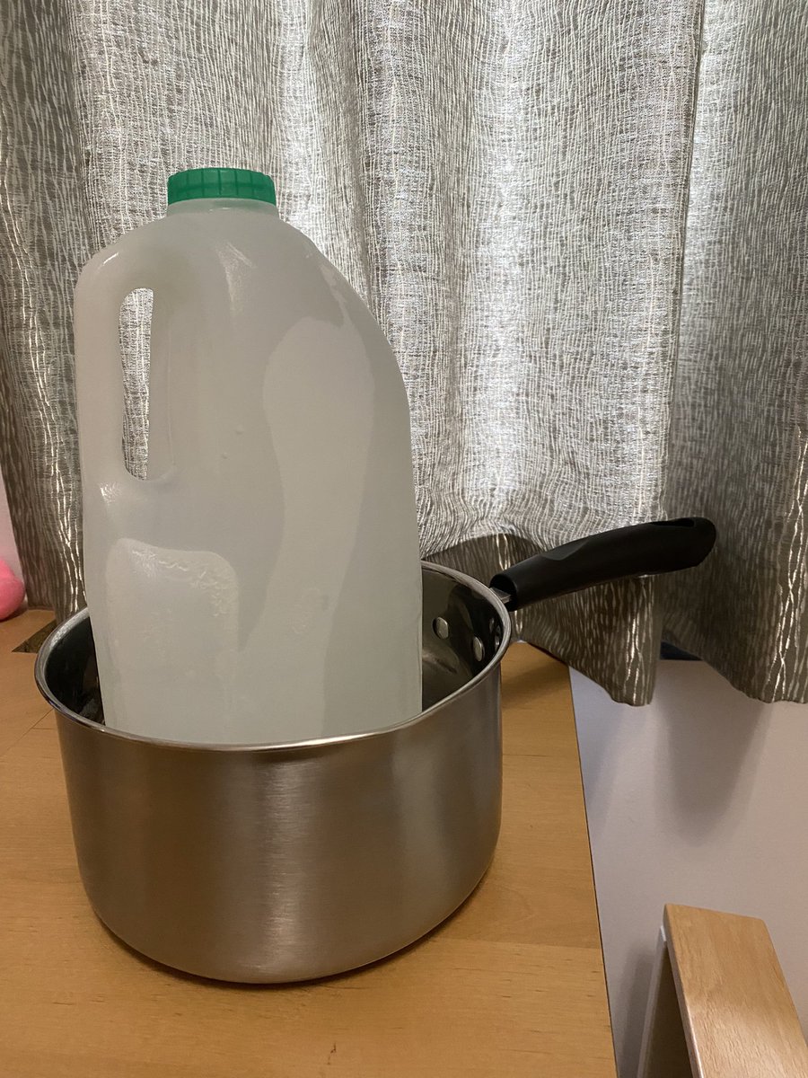 Trying the @weareKIDLY tip of putting a bottle of frozen water in a saucepan in the little one’s bedroom to see if it cools the room down. 🥵🧊