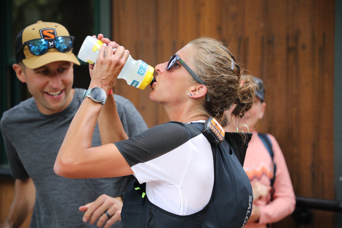 iRunFar's tweet photo. Courtney Dauwalter leads the women to Telluride (mile 27.8) in 6:27 elapsed. Looks composed. Makes quick work before pumping up the aid station on her way out. #HR100 https://t.co/fpTI7O6j9U