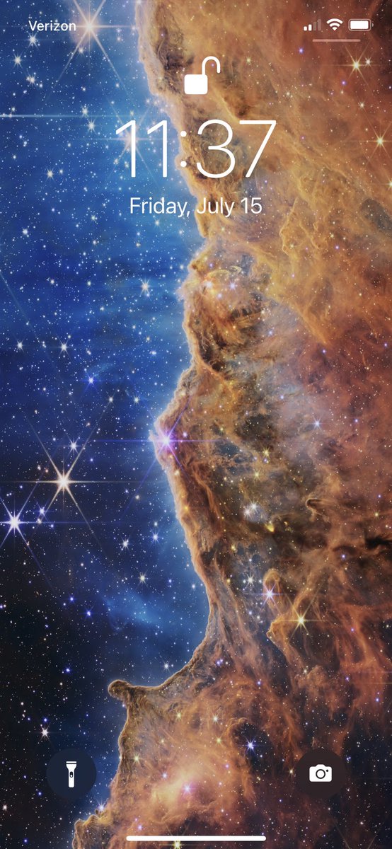 NickHendersn's tweet photo. NASA knew what they were doing having one of their first JWST images be a vertical 50/50 split of the standard movie poster colors. “If we want them to engage with science, make it a good phone background” https://t.co/6Jy9y6Qjht