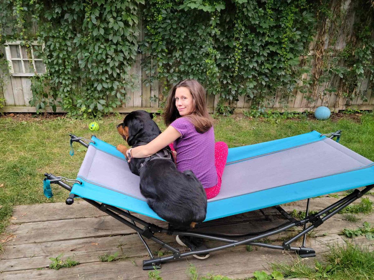 Just a girl and her Rottweiler.