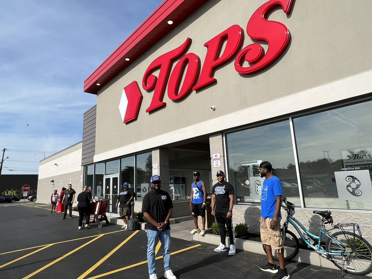 TOPS REOPENED: Local fraternity Phi Beta Sigma is standing outside to assist customers with groceries tonight
