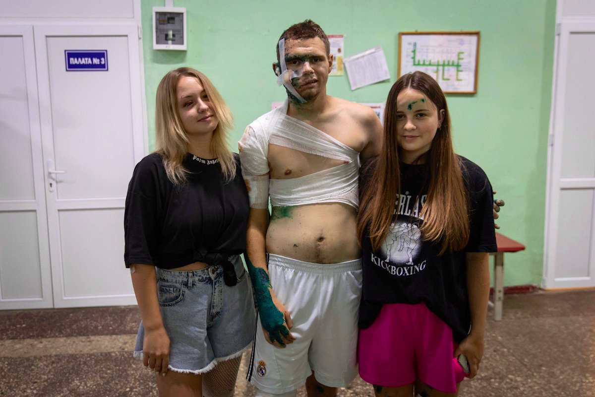 natemook's tweet photo. Diana, Nika, Glyb &amp; Alexei were celebrating graduation when a missile struck their hotel near Odesa. The @WCKitchen team went to visit them in the hospital. I share these photos, as it’s important to see what people are going through in Ukraine. Still, they remain so strong. ❤️‍🩹🇺🇦 https://t.co/nzR6SZFnpt