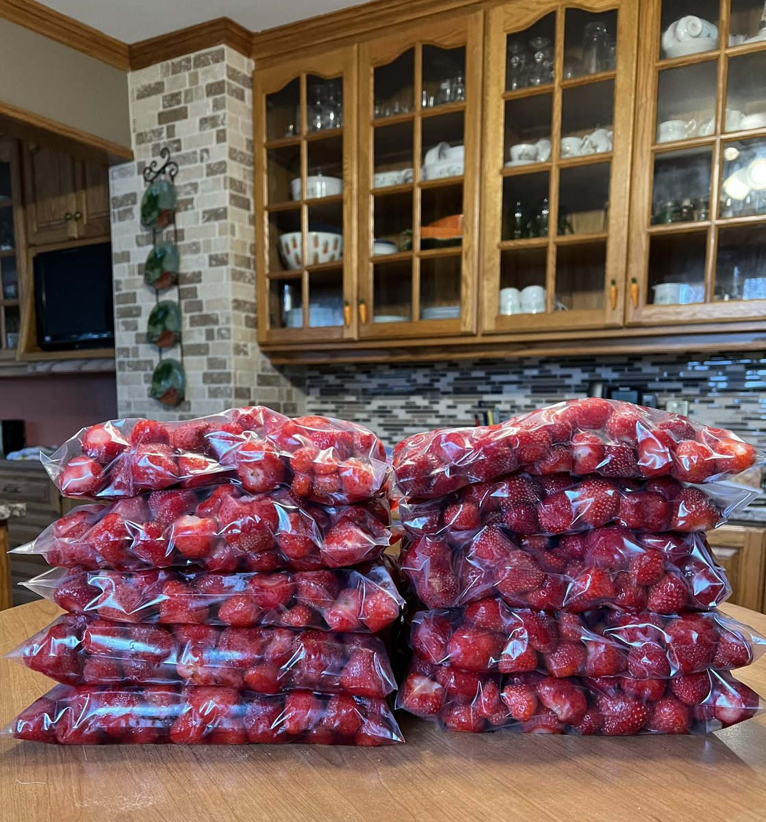 eekfarms's tweet photo. This is what 23L of #strawberries looks like (4L was snagged and left for #fresh eating). 10 bags of 8 cups of #berries for #jam making this Fall (after harvest), and throughout the Winter #homepreserving #healthy #supportlocal #eatwell #buyinseason https://t.co/kKUjmtv3GR