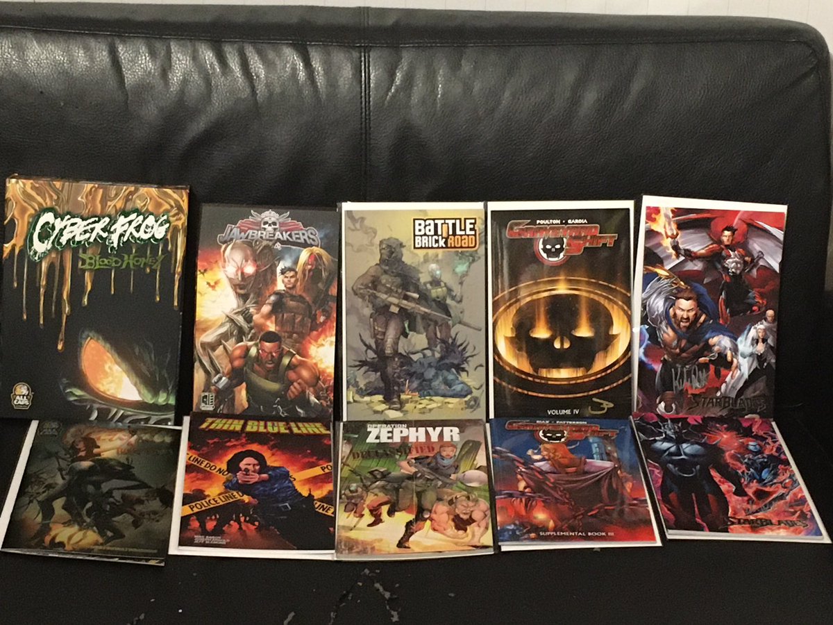 ScottSu55683697's tweet image. Here is a picture of some #comicsgate titles that I have received in the last two weeks. Comicsgate is on fire. #cyberfrog #jawbreakers #thinblueline #battlebrickroad #graveyardshift #starblades @EthanVanSciver @bloodyredbaron @DeafColorist @eric_weathers @JonMalin @KoniWaves
