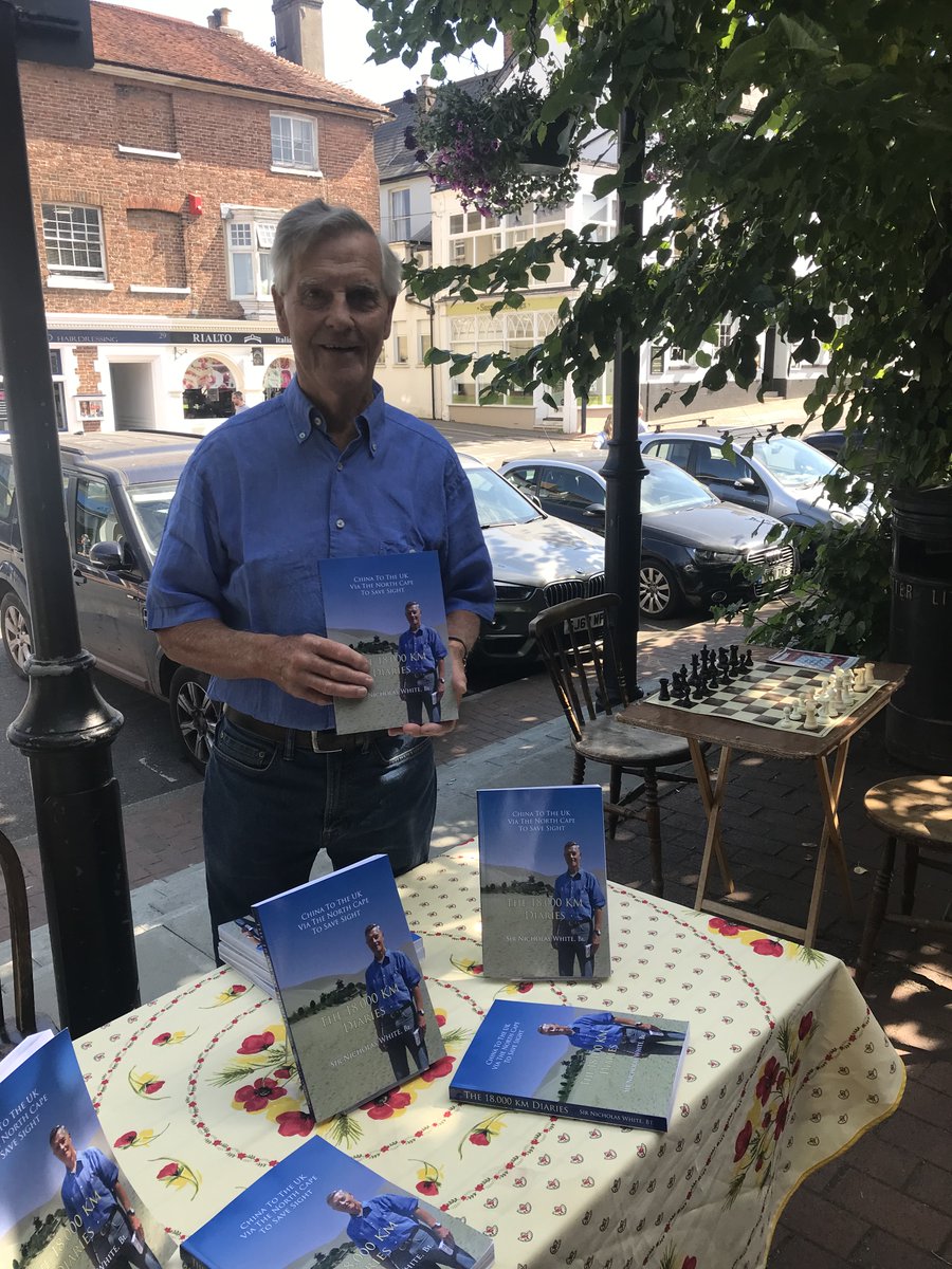 Sir Nicholas White is here now in East Grinstead High Street with his travel memoir. Every book sold with save the sight of someone by paying for a cataract operation in one of the countries he has traveled through.