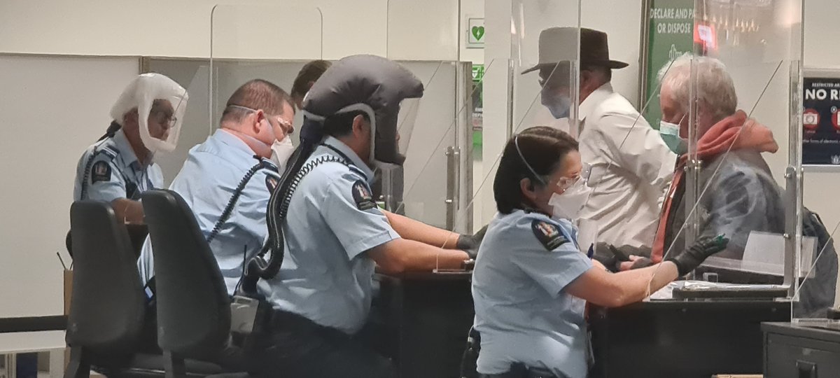 Christchurch, New Zealand. All the immigration and biosecurity staff in fit tested N95s, mainly 3M Auras. A few who failed fit test were in PAPRs. The officer I spoke to said they had had zero occupational transmission. 

IT'S. NOT. HARD.