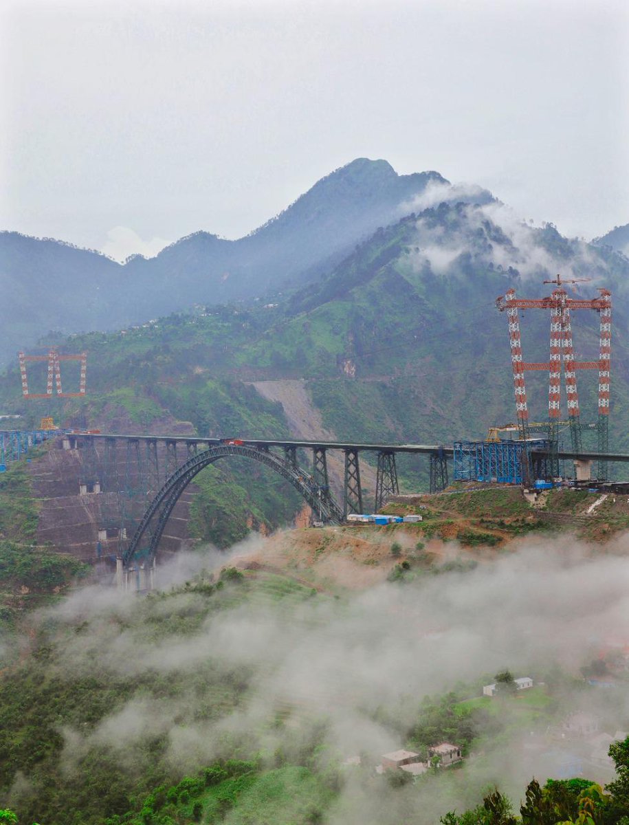 RailMinIndia's tweet photo. An Engineering Marvel, the world’s highest arch bridge surrounded by the heavenly beauty of nature: Chenab Bridge.

Photo Credits: @thetrainstory https://t.co/0uvzKj3DUv