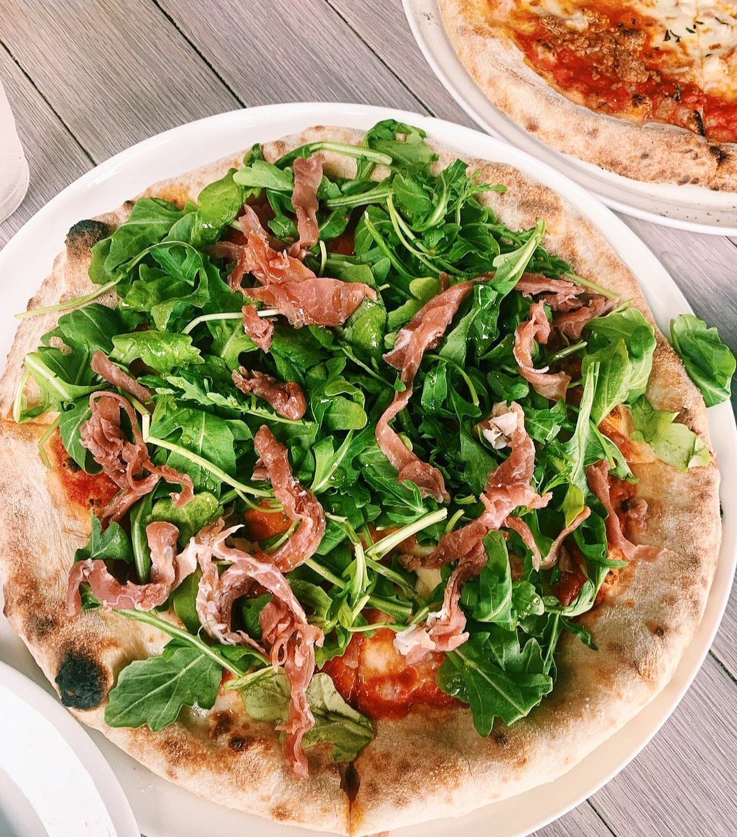 Saturdays are meant for 🍕&amp; 🍷. 📷: @ccs_foodz