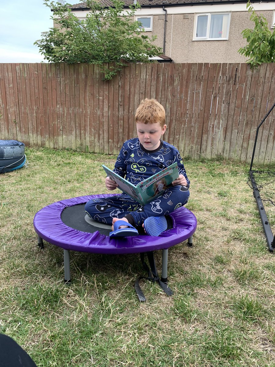 Enjoying the warm weather, reading in the garden. <a href="/AnfieldRoadY3/">AnfieldRoadY3</a>