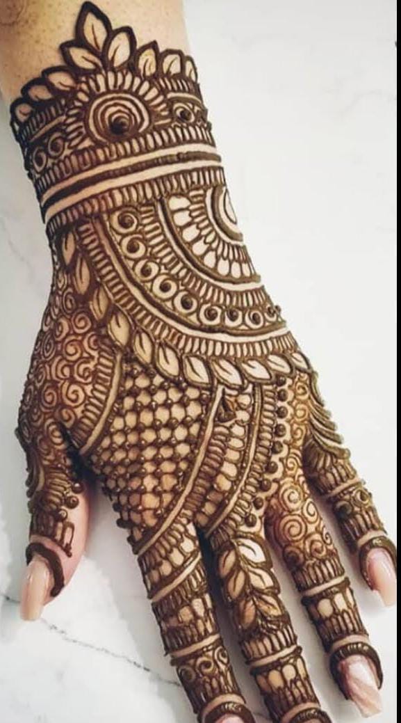 MahilaMoney's tweet photo. She takes mehndi and biryani orders, both well appreciated by her customers. Her business is based out of Bangalore and she has been doing this for the past 7 years. Give her a thumbs up :) #MMUserStories #re https://t.co/MIlC8OoYuI