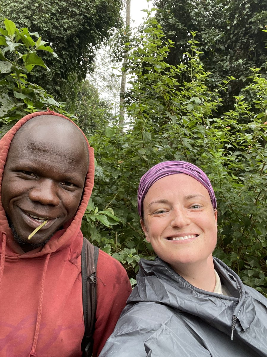 DrEBallare's tweet photo. 5am wake-up call this morning (ok I hit snooze til 5:20), rain selfies, and searching for the #chimps brings us to the edge of the forest. Walked 10,372 steps by 10am. Sometimes “bad days” are still fun days 🐵🤪🌳 @BugomaPrimates #fieldwork #AcademicChatter #postdocchatter https://t.co/k4O0WjSOdl