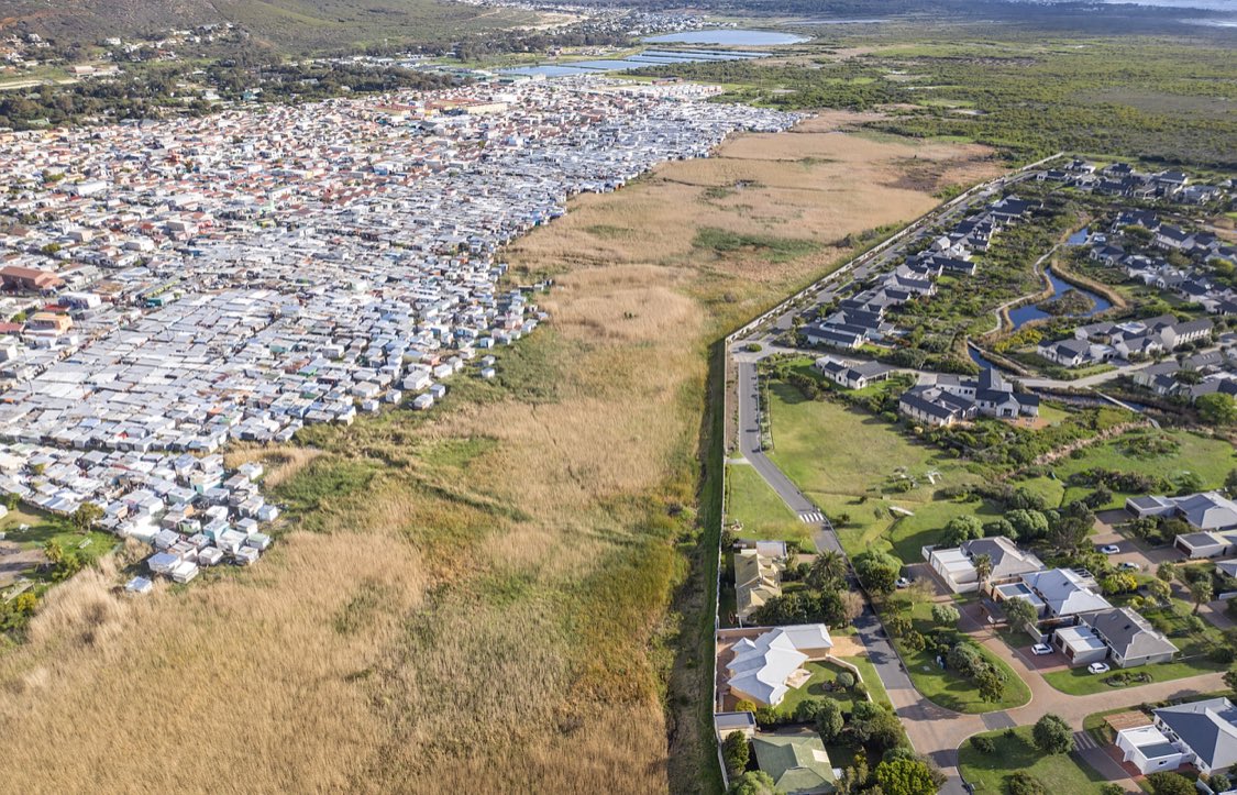 A recent report by the World Bank says South Africa is the world’s most unequal country, where 10% of the population owns 80% of the wealth. These photos by Johnny Miller highlight the architecture of separation and inequality.