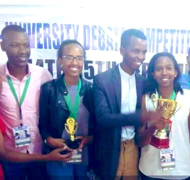 edward_mugabo's tweet photo. Very proud to say that I, together with @KabandaErica @JesseShyaka and @nish_ariane won a double in this great competition (Aspire National University Championship 2018). What a massive win it was! Great memories.
Forget about the picture quality😂.
@AspireDebateR @Hakim_mugenyi https://t.co/Q0XZFtgl8R