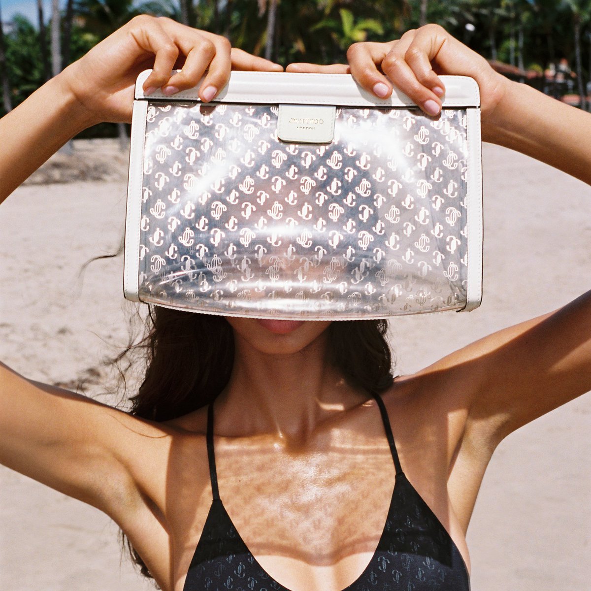 Looking for the ultimate beachside essentials? Our VARENNE Pouch is a clear winner #JimmyChooSummer bit.ly/3cKcHhv