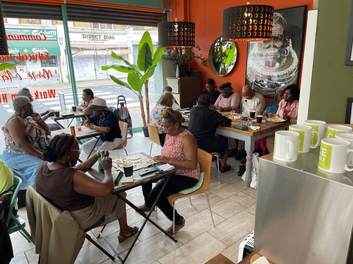 ASKI_UK's tweet photo. We ended our month long #windrush celebrations with our games day yesterday. Good food, refreshments, #dominos #scrabble and #cardgames #aski #boardgames #communitycafe #charity #croydon #tacklingisolation #thorntonheath #placeatmytable https://t.co/Q2aSewJYFp